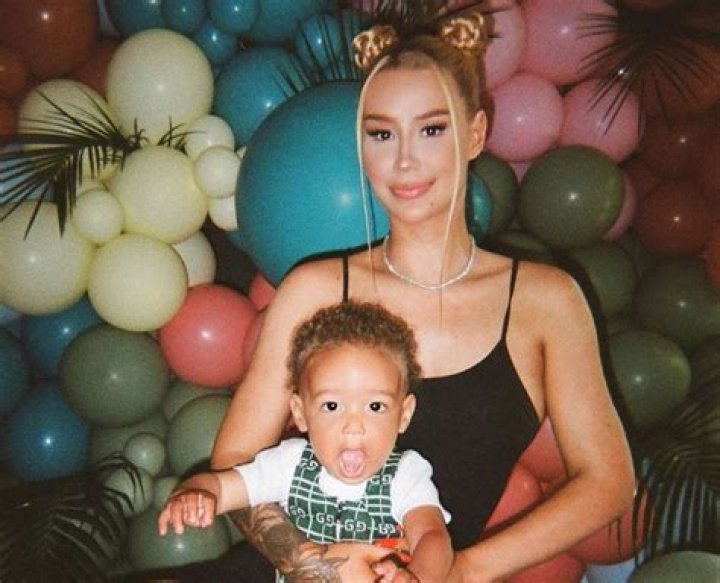 Iggy Azalea’s Son Onyx, 7 Months, Sleeps In Her Arms While On A Plane In Rare Photo: ‘Beautiful Boy’