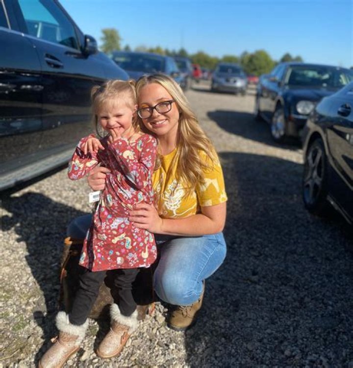 Jade Cline holds her baby
