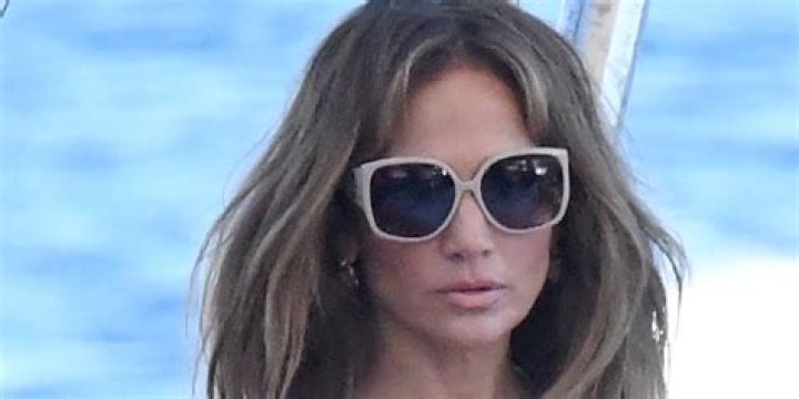 Jennifer Lopez Sizzles In Sexy Black Cutout Bikini & Sheer Coverup Poolside: Photos