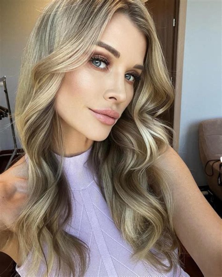 Joanna Krupa Poses By Her Dining Table Set-Up