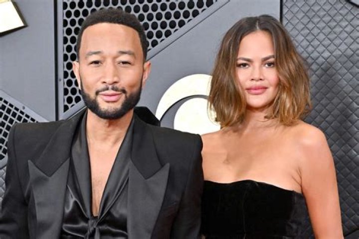 John Legend Smooches Chrissy Teigen at the Emmys