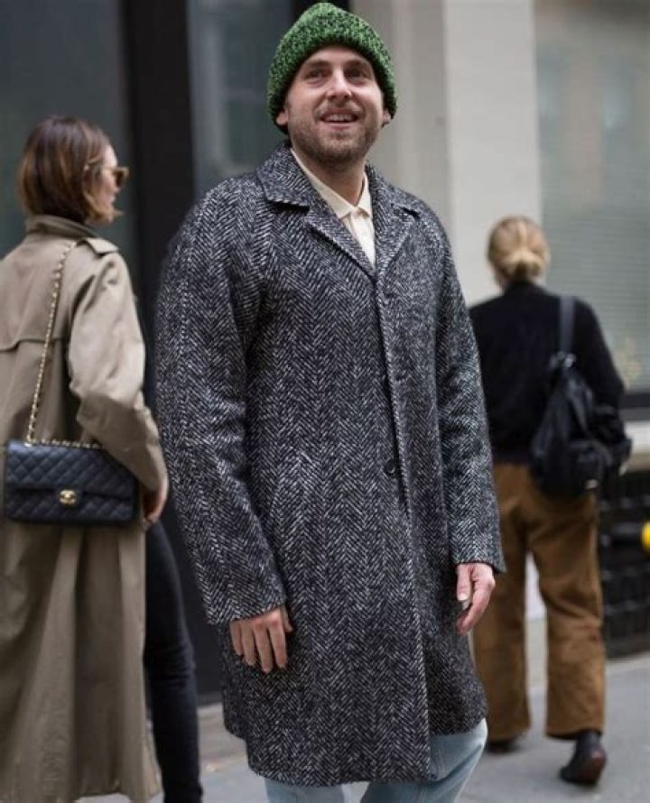 Jonah Hill Carries a Coat in 2017
