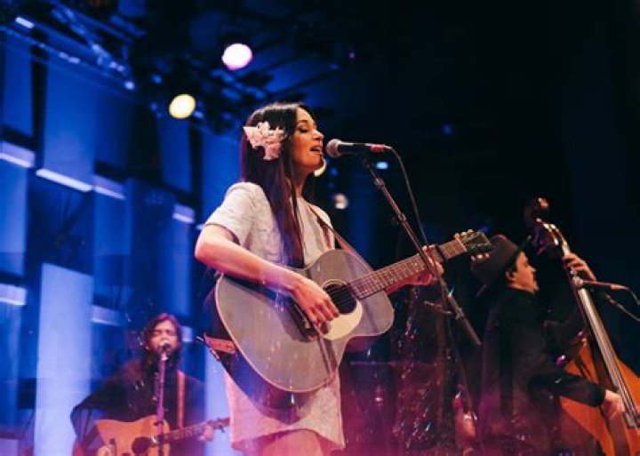 Kacey Musgraves Lights One Up at the Flower By Edie Parker Holiday Party