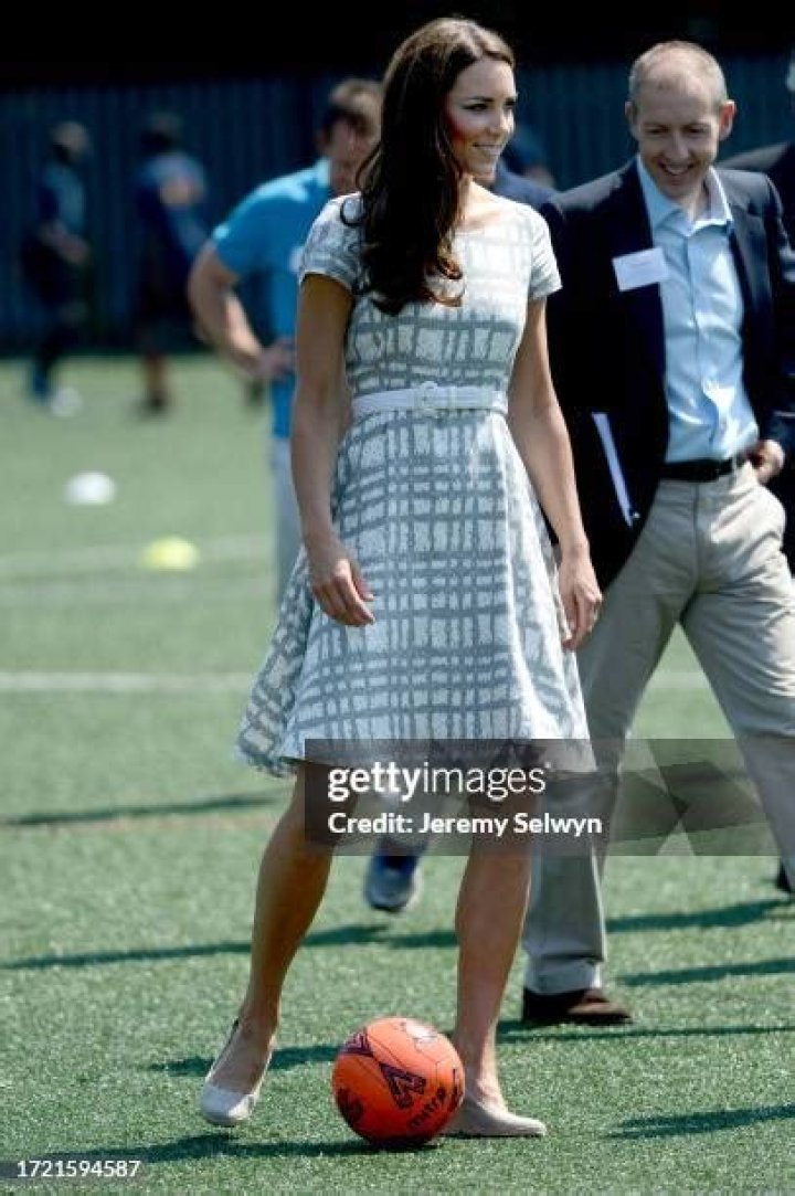 Kate Middleton playing football