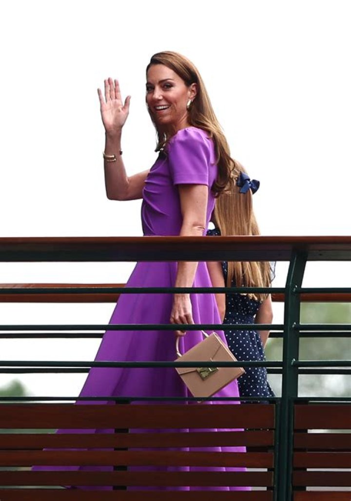 Kate Middleton waves