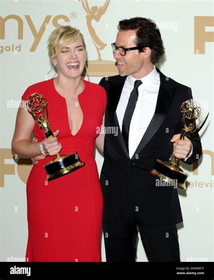 Kate Winslet and Guy Pearce with their Emmy Awards