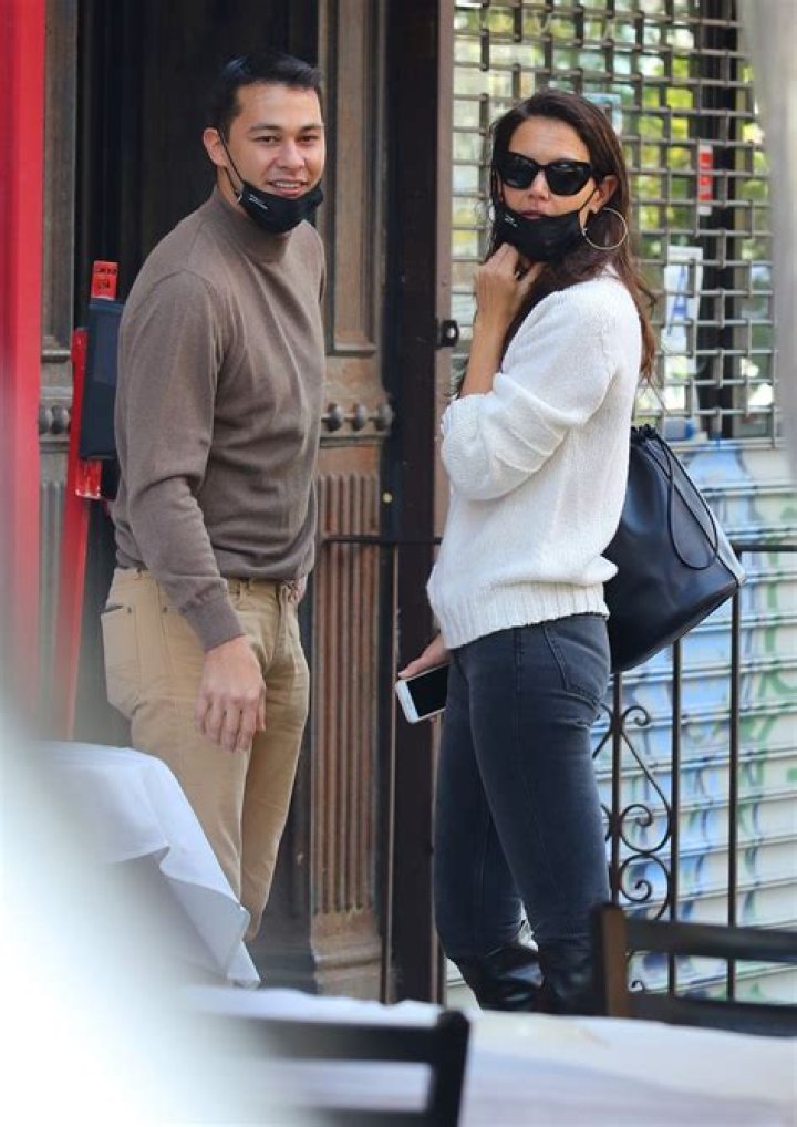 Katie Holmes and Emilio Vitolo Jr. hold hands on a date.