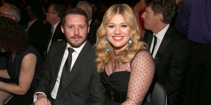 Kelly Clarkson Brandon Blackstock Kelly Clarkson arrives with Brandon Blackstock for the ceremonial swearing-in of President Barack Obama at the U.S. Capitol during the 57th Presidential Inauguration in Washington. Clarkson says she's expecting her first child. The 31-year-old singer said, on Twitter that she and husband Blackstock are expecting their first child together People-Kelly Clarkson, Washington, USA