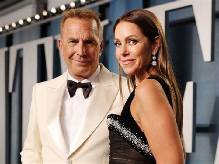 Kevin Costner, Christine Baumgartner, and kids