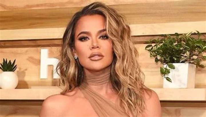 Khloe Kardashian Keeps Up Her Tough Workouts In Hot Pink Crop Top & Leggings — Photos & Video