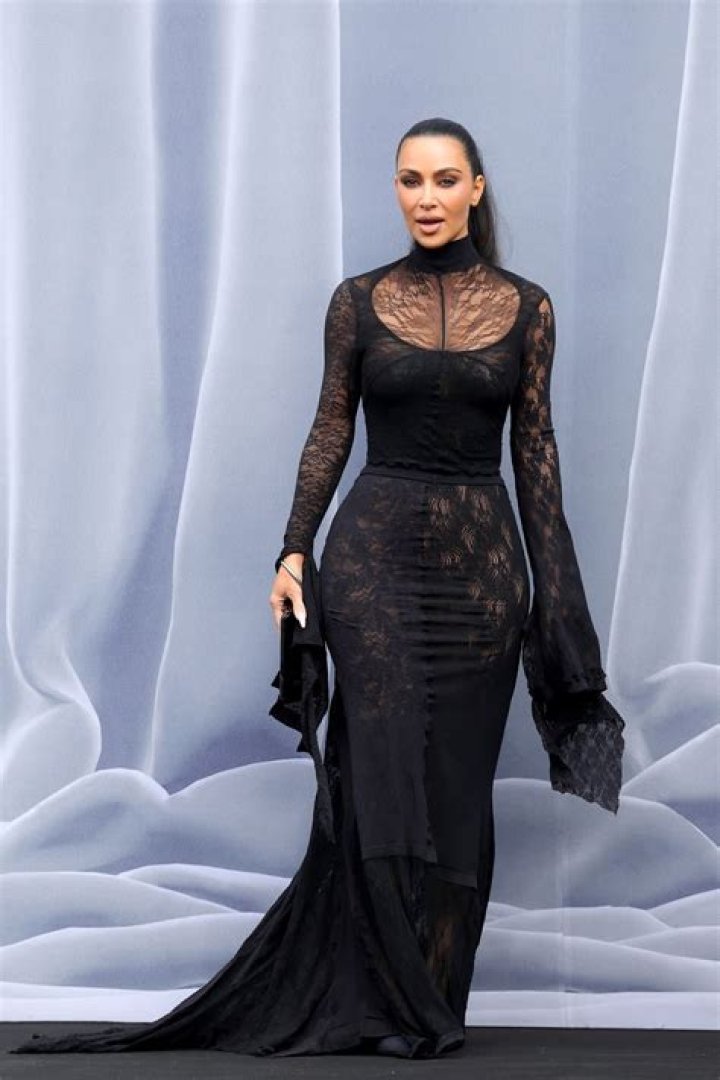 Kim Kardashian in Black Outfit & Boots