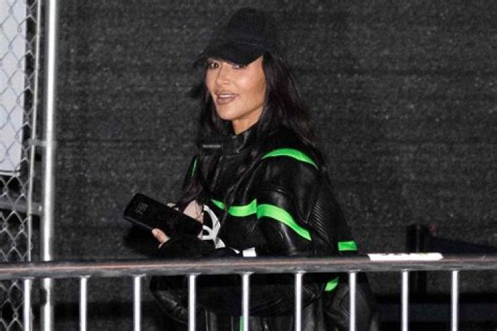 Kim Kardashian is all smiles as she parties with friends in Miami for the opening of the Goodtime Hotel in South Beach. Kim was spotted inside with owner David Grumman who she surprised for the event and then later headed to Papi Steak and her luxury hotel. She was in a custom Lamborghini and Rolls Royce with Jonathan Cheban and longtime friends Stephanie Sheppard and Simon Huck. The friends all had a laugh as they waited for their cars to head to the event. The 40-year-old reality TV bombshell, who is in the process of divorcing her third husband Kanye West, cut a typically glamorous figure on her latest night out. She slid her iconic hourglass frame into a glimmering golden peekaboo dress that showed off her cleavage to full advantage. 17 Apr 2021 Pictured: Kim Kardashian. Photo credit: MEGA TheMegaAgency.com +1 888 505 6342 (Mega Agency TagID: MEGA747211_001.jpg) [Photo via Mega Agency]