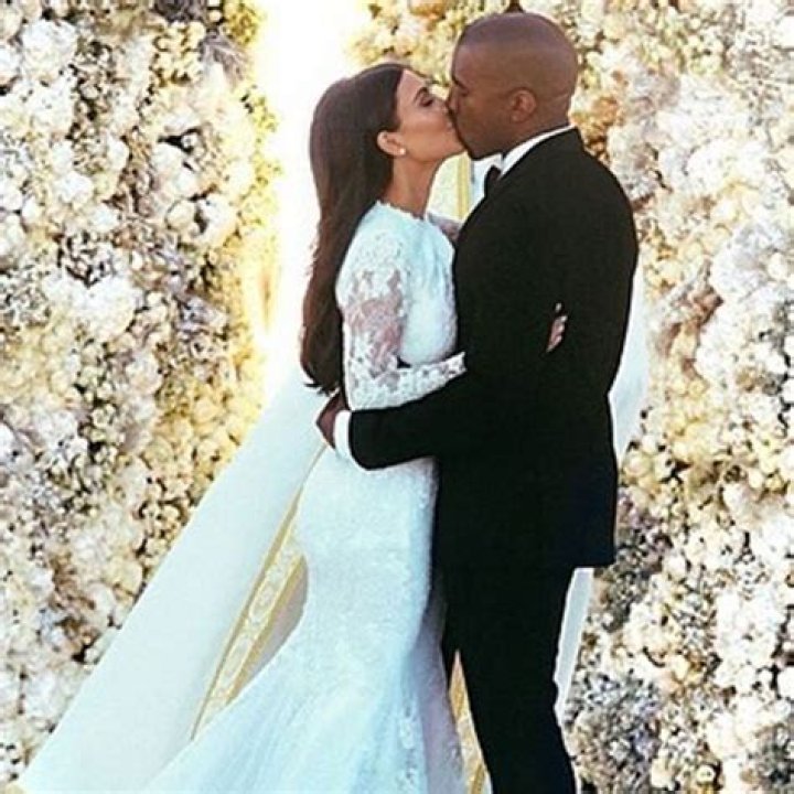 Kim Kardashian & Kanye West ‘Trying To Work Things Out’ After Her Wedding Dress Appearance