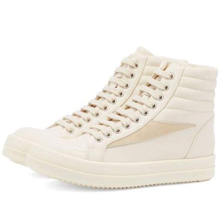 Kim Kardashian Rocked These High-Top Sneakers In Japan & You Can Shop Her Exact Pair