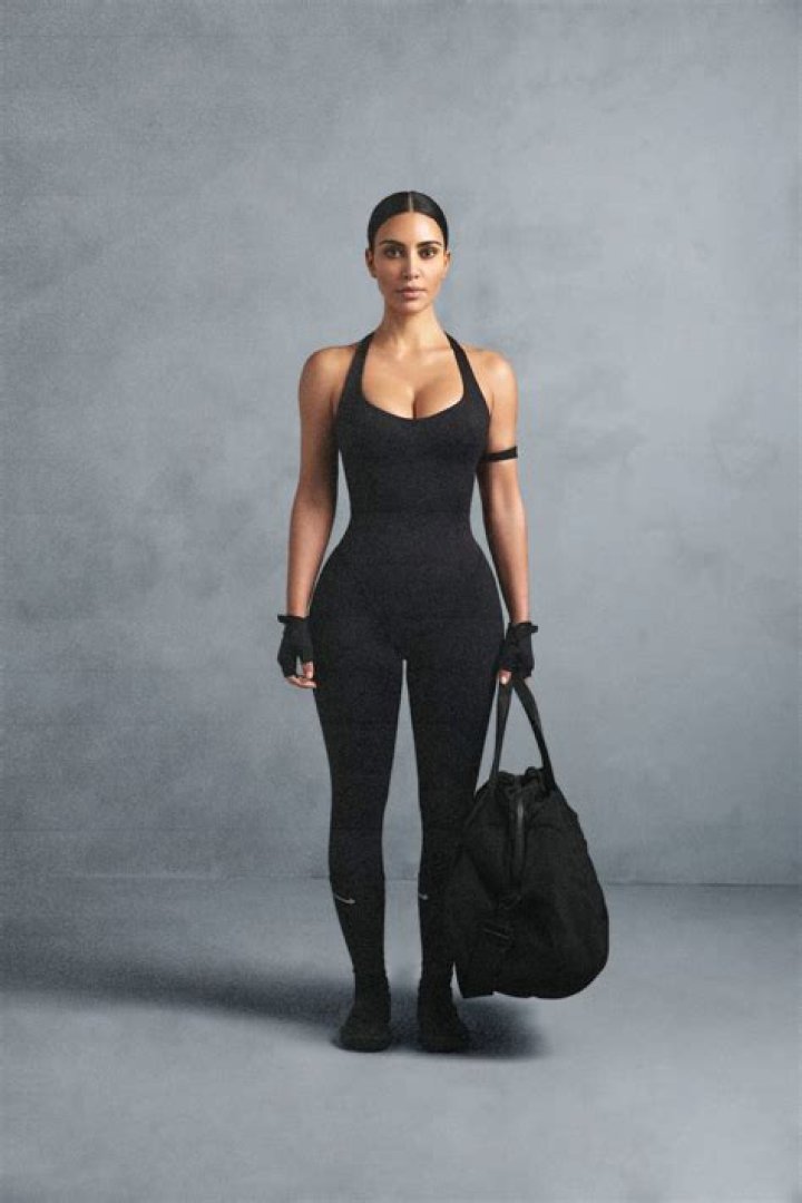Kim Kardashian Stretches Out On Beach In New Figure Hugging Skin Tone SKIMS Body Wear — Pic