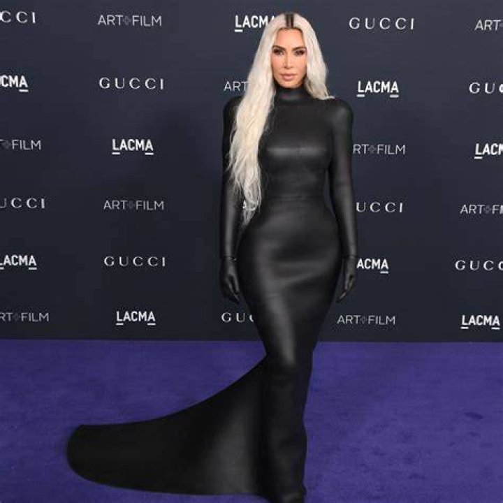 Kim Kardashian wears a form fitting fire dress in Los Angeles. Pictured: kim kardashian Ref: SPL5303545 130422 NON-EXCLUSIVE Picture by: PhotosByDutch / SplashNews.com Splash News and Pictures USA: +1 310-525-5808 London: +44 (0)20 8126 1009 Berlin: +49 175 3764 166 World Rights