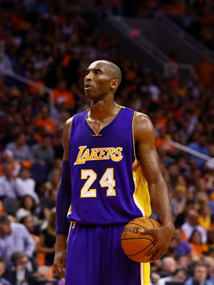 Kobe Bryant Los Angeles Lakers guard Kobe Bryant celebrates a three pointer against the Denver Nuggets during the third quarter of Game 4 of the teams' Western conference semifinals basketball game in Denver, . The Lakers beat the Nuggets 107-101 to sweep the series Lakers Nuggets Basketball, Denver, USA