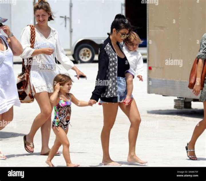 Kourtney carries Penelope Disick