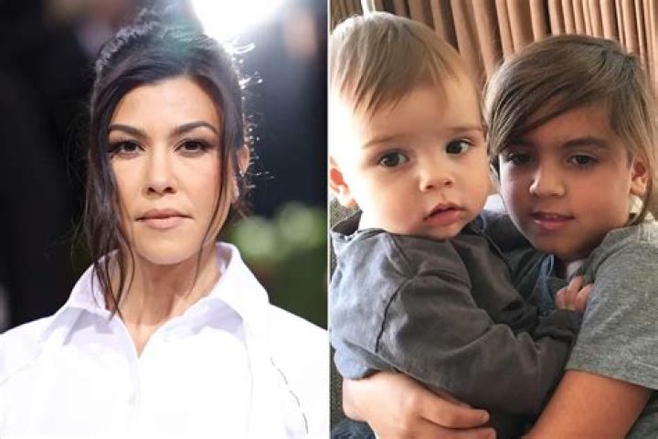 Kourtney Kardashian holds Reign Disick