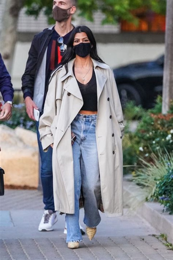 Kourtney Kardashian In A Plunging Top With Travis Barker