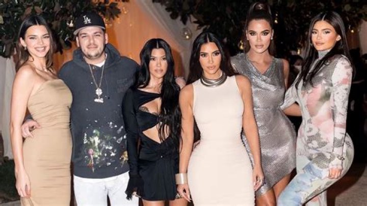 Kylie Jenner, Kim Kardashian, & All The Sisters Reunite For ‘Spice Girls’ Family Pic Crashed By Saint