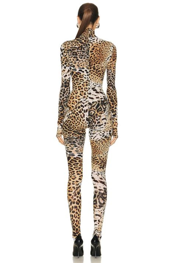 Kylie Jenner Shows Off Insanely Long Blonde Hair As She Slips Into Sexy Animal Print Body Suit – Watch