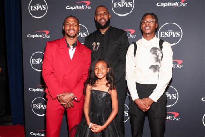 LeBron James Cuddles With Wife Savannah, Daughter Zhuri & Sons Bronny & Bryce In Beautiful Family Snap