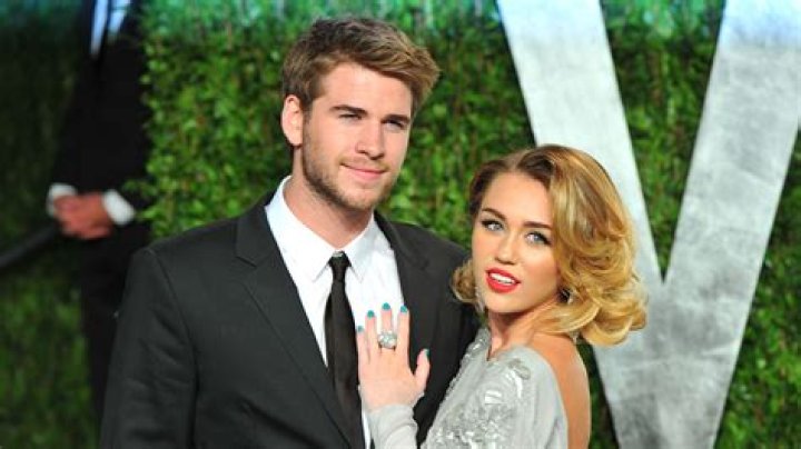 Liam Hemsworth & Miley Cyrus Postpone Wedding But Still Dating — Report