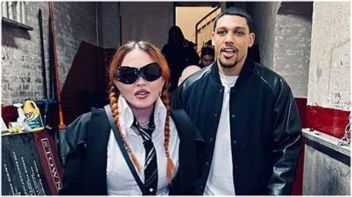 Madonna, 64, Channels Britney Spears In Schoolgirl-Look At Concert With Boyfriend, 29, & 3 Of Her Kids