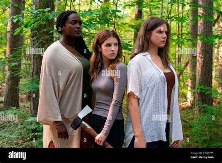 Mari (Kaniehtiio Horn) watches Sel as they pause in the woods. (National Geographic/Peter H. Stranks)