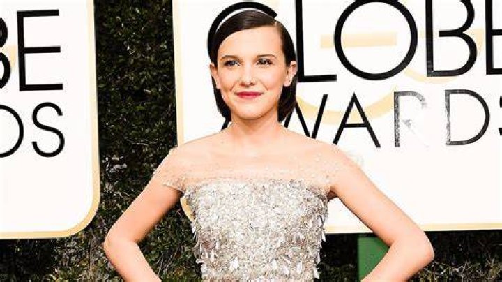 Millie Bobby Brown hits the beach as she films a scene for her new movie 'Electric State'. The British actress, 18, was seen in a white T-shirt as she walked across the sand during filming in Acworth, Georgia. 24 Oct 2022 Pictured: Millie Bobby Brown. Photo credit: OG/MEGA TheMegaAgency.com +1 888 505 6342 (Mega Agency TagID: MEGA910806_016.jpg) [Photo via Mega Agency]