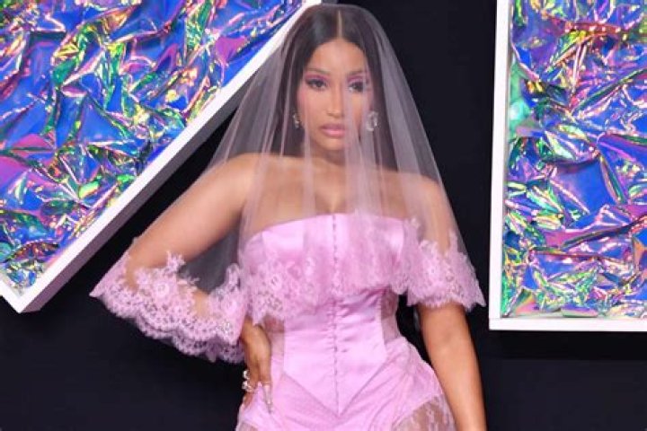 Nicki Minaj Slays In Pink Corset With Fishnet Showcasing Cleavage – Hollywood Life