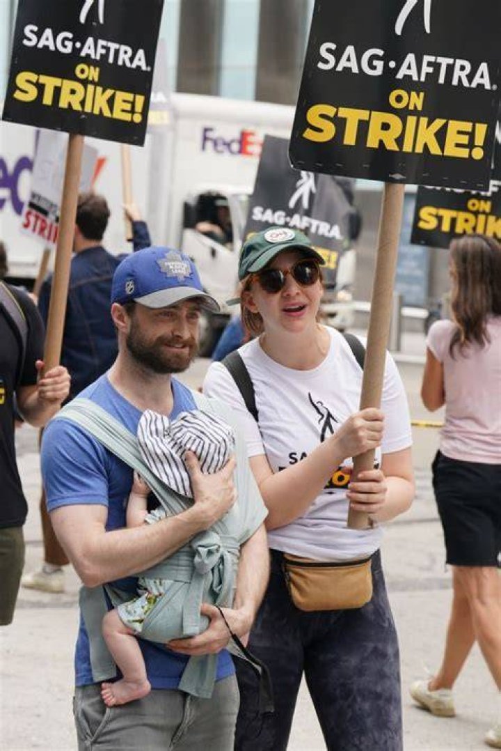 Non Exclusive Mandatory Credit: Photo by Kristin Callahan/Shutterstock (14017242j) Daniel Radcliffe, Erin Darke SAG-AFTRA Strike Picket Line, New York, USA - 21 Jul 2023