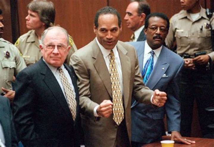 OJ SIMPSON LEONARD O.J. Simpson leaves Los Angeles County Superior court in Santa Monica, Calif., after testifying in the wrongful death civil trial against him. At left is defense attorney Daniel Leonard SIMPSON, SANTA MONICA, USA