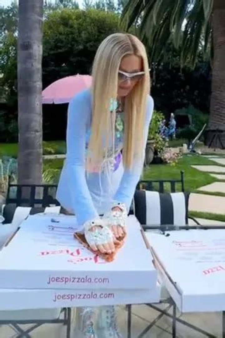 Paris Hilton showing off her dress