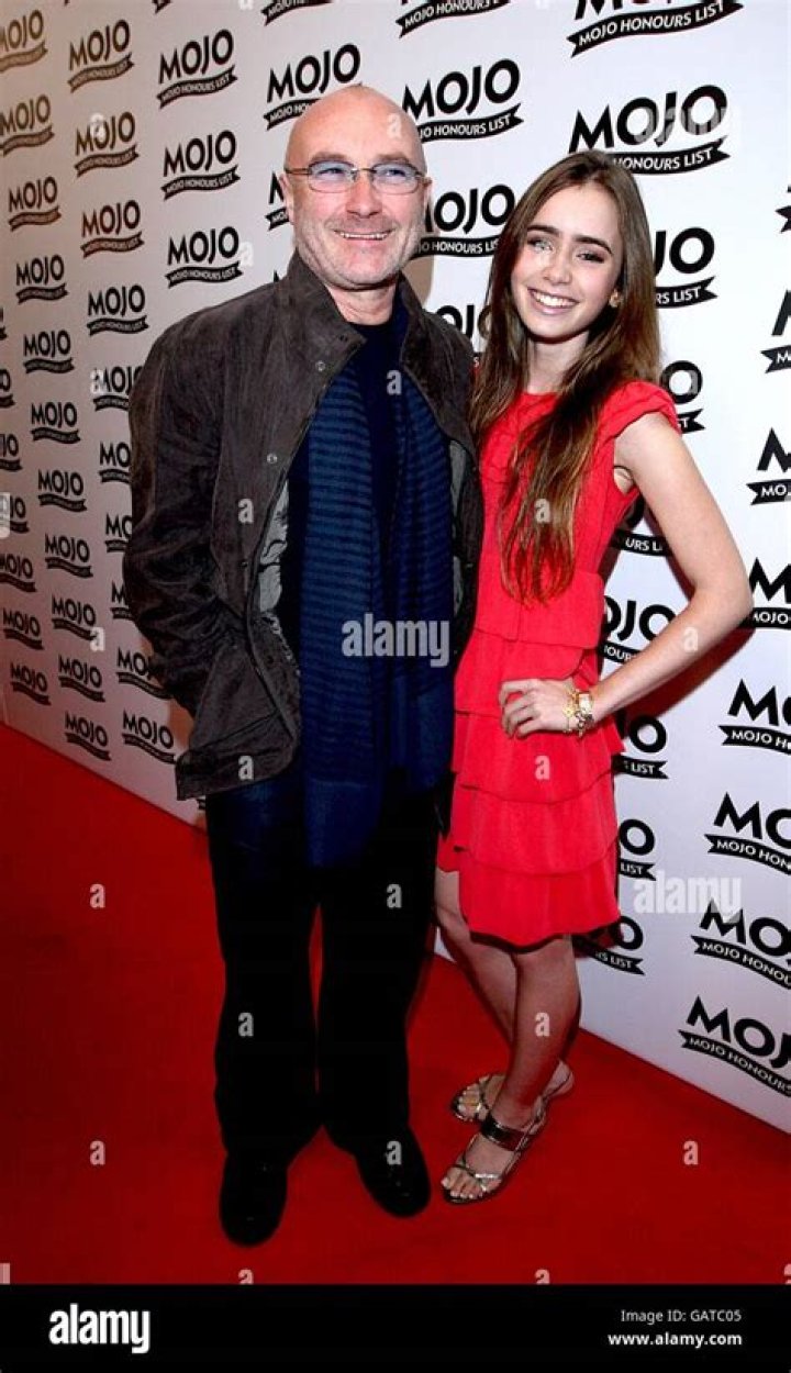 Phil Collins and Lily Collins (daughter) 'The Blind Side' Film Premiere, New York, America - 17 Nov 2009 Based on the book by Michael Lewis, this film follows the story of American footballer Michael Oher (played by Quinton Aaron), who currently plays for the NFL&rsquo;s Baltimore Ravens. It follows his impoverished upbringings, his years at a Christian School and his adoption by Sean and Leigh Anne Tuohy, the couple played in the film by Tim McGraw and Sandra Bullock. Lily Collins (daughter of rocker Phil) plays the Tuohys&rsquo; daughter, aptly enough called Collins.