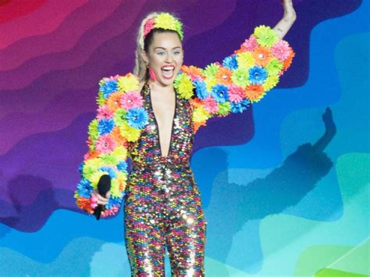 Photos Of Her Crazy Outfits & More – Hollywood Life