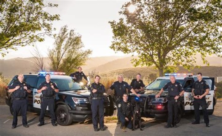 Police at a mall near the Walmart shooting scene