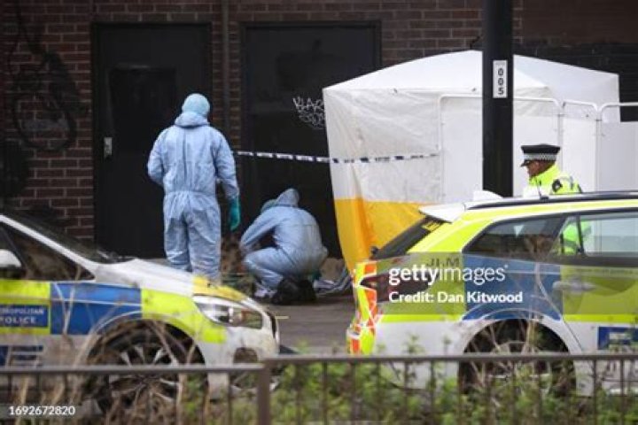 Police work at the scene of a shooting in Dayton, Ohio