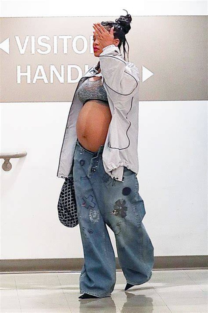 Pregnant Rihanna Shows Off Bare Baby Bump In Sparkly Bra Top & Unbuttoned Jeans In LA: Photo