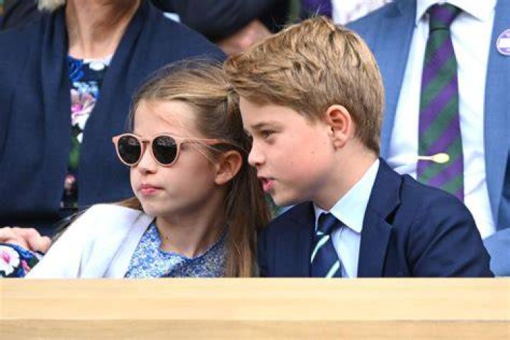Prince George and Princess Charlotte on a balcony