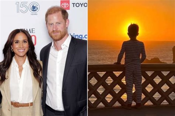 Prince Harry Holds Archie And Smiles At Meghan Markle