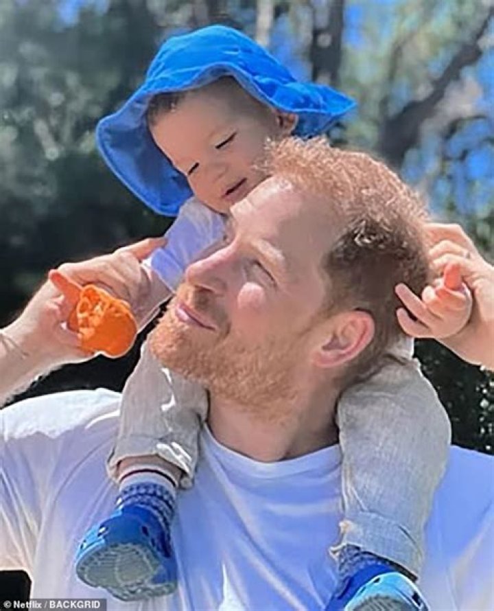 Prince Harry Holds Son Archie During His Public Debut