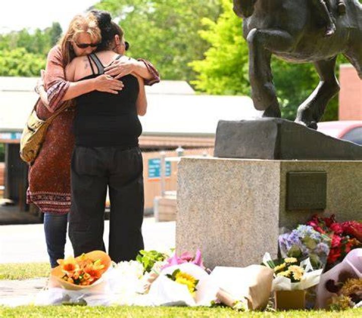 Residents comfort each other in Dayton, Ohio