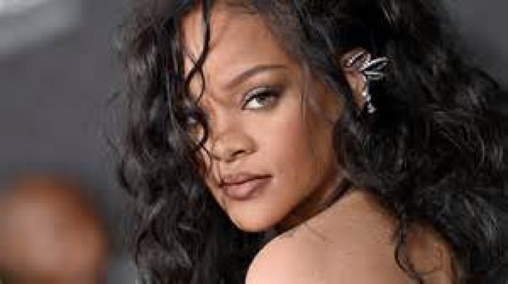 Rihanna was spotted partying hard at Cropover Festival Kadooment Day in Barbados . She looked amazing with a Blue Wig, and a Bejeweled Costume . She wore colorful feather headers as she waved to fans along the parade route. She seemed to be having an amazing time. Lewis Hamilton on the other hand, tried to get on the same float as his rumored ex, and she wanted no part. Him and his crew were forced to walk behind in the middle of the street. Pictured: Rihanna,Lewis Hamilton,Rihanna Lewis Hamilton Ref: SPL1552165 070817 NON-EXCLUSIVE Picture by: SplashNews.com Splash News and Pictures Los Angeles: 310-821-2666 New York: 212-619-2666 London: +44 (0)20 7644 7656 Berlin: +49 175 3764 166 World Rights