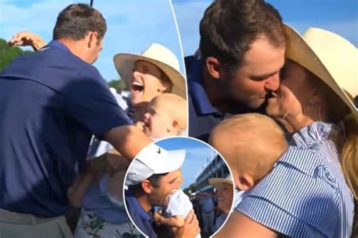 Scottie Scheffler kisses his wife Meredith Scudder after winning the 86th Masters golf tournament, in Augusta, Ga Masters Golf, Augusta, United States - 10 Apr 2022