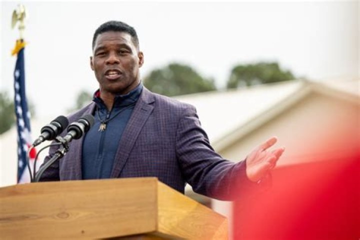 Senate candidate Herschel Walker speaks during former President Donald Trump's Save America rally in Perry, Ga. Senate Minority Leader Mitch McConnell on Wednesday, Oct. 27, endorsed Herschel Walker's Republican primary bid for a Senate seat in Georgia Election 2022 Senate Georgia, Perry, United States - 25 Sep 2021