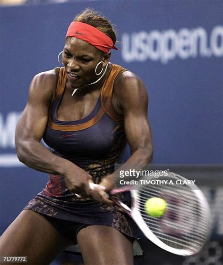 Serena Williams hits a ball
