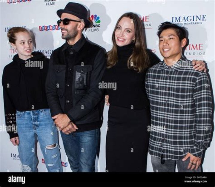 Shiloh Jolie-Pitt, street artist JR, actress Angelina Jolie and Pax Jolie-Pitt 'PAPER & GLUE' film premiere, Los Angeles, California, USA - 18 Nov 2021