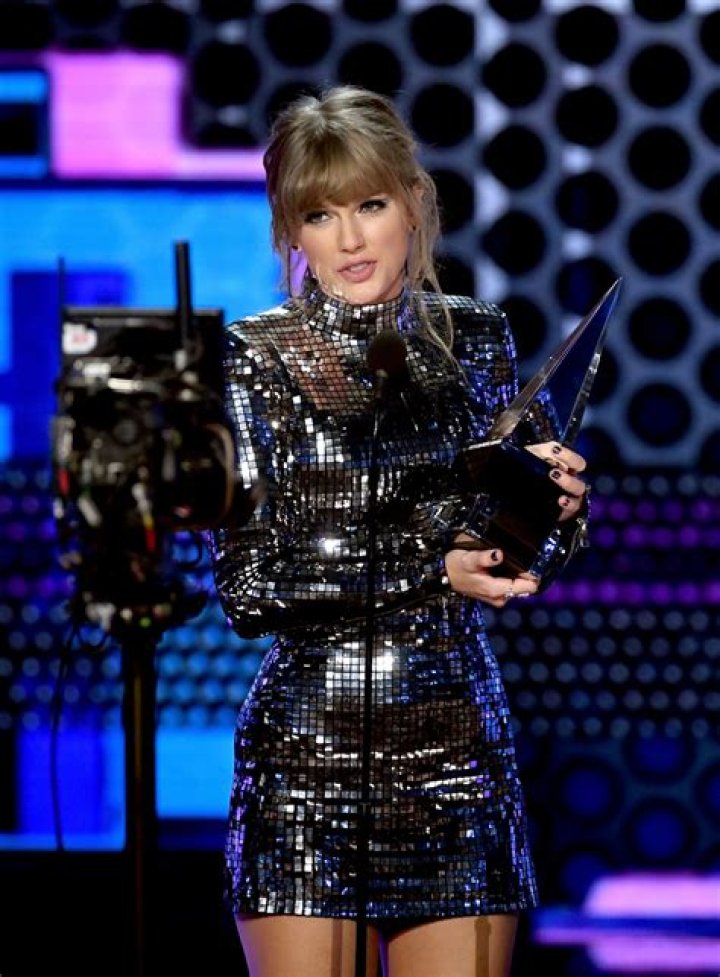 Taylor Swift accepts the award for favorite pop album for "Red (Taylor's Version)" at the American Music Awards, at the Microsoft Theater in Los Angeles 2022 American Music Awards - Show, Los Angeles, United States - 20 Nov 2022
